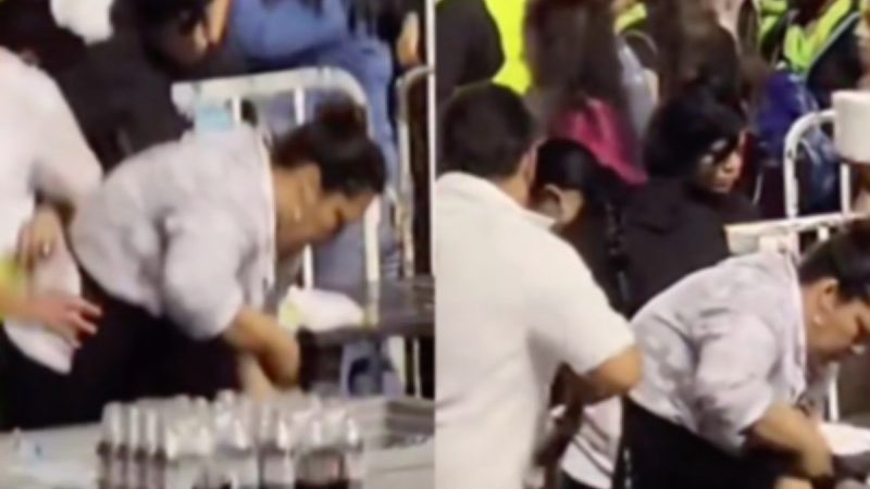 Vendedora de chelas llena con sobrantes los vasos en concierto del ‘Buki’