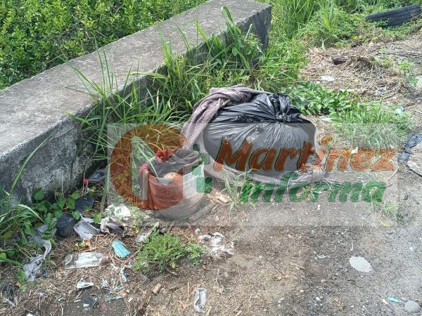 Hallan restos humanos embolsados